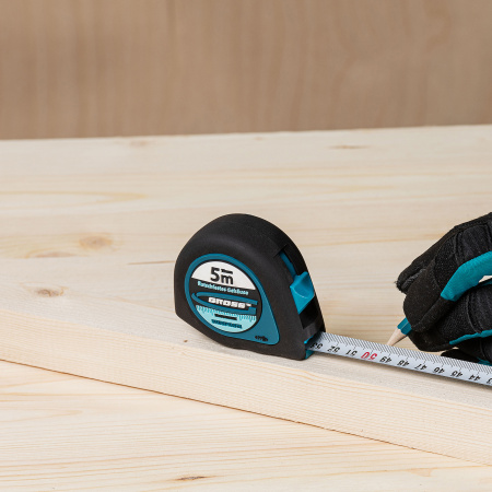 Рулетка "Ergonomisch",5 м x 19 мм,магнитный обрезиненный зацеп Gross цена